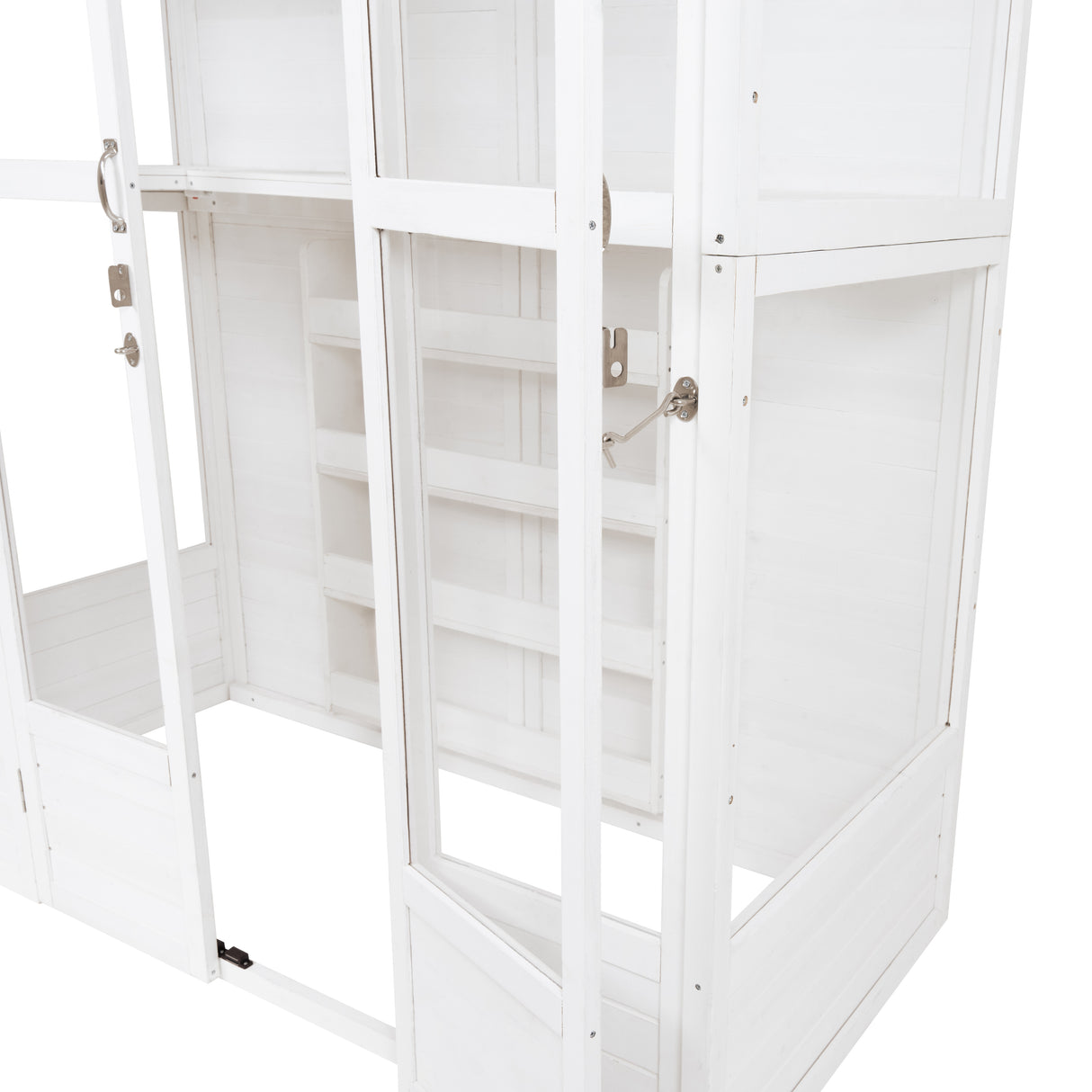 Victorian greenhouse in white wood featuring large glass panels, multiple shelves, and a classic design for elegant gardening