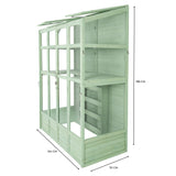 Victorian-style greenhouse in soft green wood, featuring multiple shelves, glass panels, and a tall, elegant design for plants