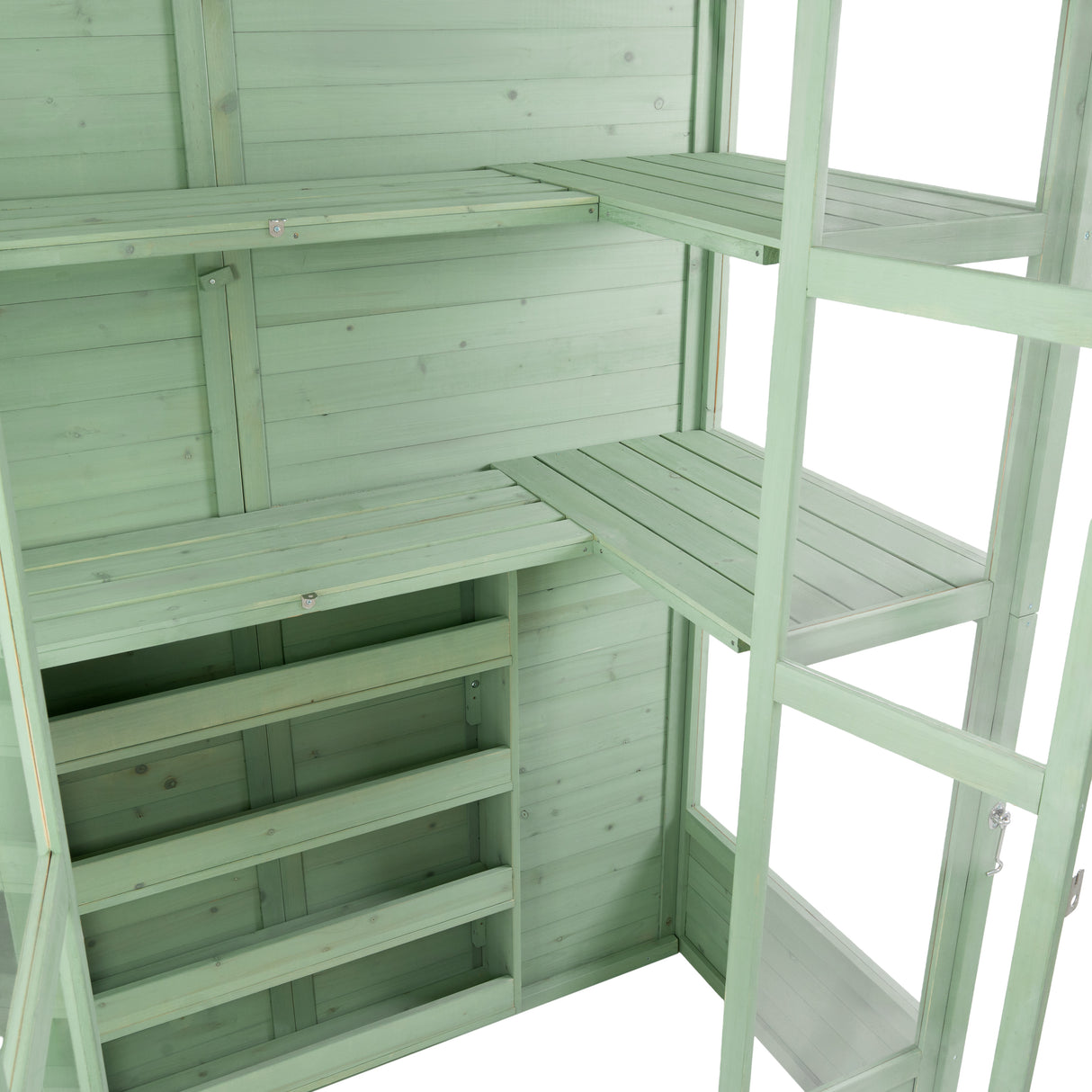 Victorian greenhouse interior featuring light green wooden shelves, spacious design, and smooth, polished surfaces for plant display