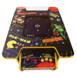 Retro cocktail table arcade game machine featuring vibrant graphics of Pac-Man, Frogger, and Space Invaders on a glossy black surface