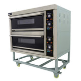 Large commercial pizza oven with two black glass doors, stainless steel body, control panel, and sturdy wheeled base for mobility