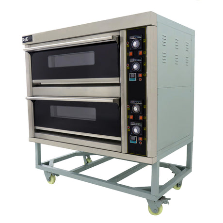 Large commercial pizza oven with two black glass doors, stainless steel body, control panel, and sturdy wheeled base for mobility