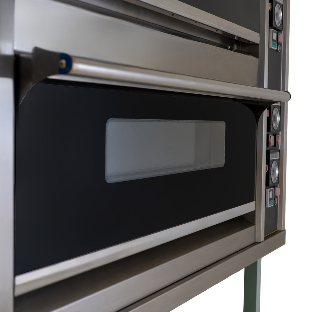 Large commercial pizza oven with stainless steel finish, dual baking chambers, and temperature controls for efficient cooking