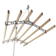 Ceiling-mounted clothing airer with white metal frame and natural wooden rods, designed for efficient drying and space-saving