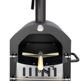 Black KuKoo outdoor pizza oven with a wooden pizza peel, featuring a round thermometer and a sleek, modern design for outdoor cooking