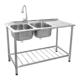 Stainless steel commercial catering sink with double bowls, right-hand drainer, and adjustable faucet, featuring a sturdy frame