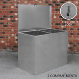 Galvanised steel feed store with two compartments, featuring a secure padlock and a sleek, shiny finish against a brick background