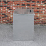 Galvanised feed store with two compartments, featuring a sleek metallic finish, sturdy construction, and a practical handle for easy access