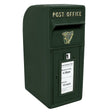Traditional green Irish post box with a gold harp emblem, featuring a slot for letters and a collection time notice