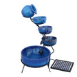 Elegant blue ceramic 4-tier spilling bowls water feature with a solar panel, showcasing smooth textures and a tranquil design