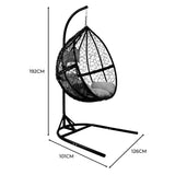 Black hanging rattan egg chair with a cushioned seat, featuring a sturdy metal frame and a unique woven design, perfect for outdoor relaxation