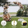 Elegant gold wedding moongate arch adorned with vibrant flowers and greenery, perfect for outdoor ceremonies and celebrations