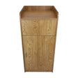 Light oak wooden litter bin and tray stand with a smooth finish, featuring a top shelf and a spacious cabinet below for storage