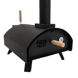 Classic outdoor pizza oven with a sleek black finish, wooden handle, and built-in thermometer for perfect cooking control