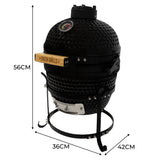 Black ceramic 13" Kamado BBQ oven with a textured surface, wooden handle, and built-in thermometer, standing on a sturdy metal frame