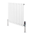 Sleek white oval single column radiator with vertical slats, featuring polished metal valves and sturdy chrome feet for stability