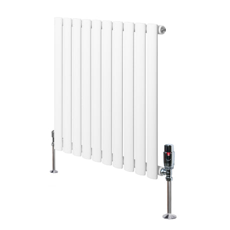 Sleek white oval single column radiator with vertical slats, featuring polished metal valves and sturdy chrome feet for stability
