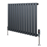 Anthracite grey oval single column radiator with sleek vertical bars and polished valves, designed for modern heating solutions