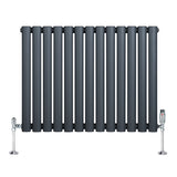 Anthracite grey oval single column radiator with vertical bars and chrome valves, showcasing a sleek, modern design and smooth texture