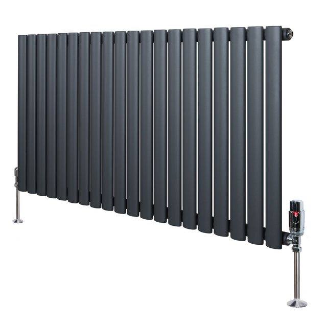 Oval single column radiator in anthracite grey, featuring sleek vertical tubes and polished valves, ideal for modern interiors
