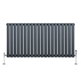 Oval single column radiator in anthracite grey, featuring sleek vertical bars and polished chrome valves, ideal for modern interiors