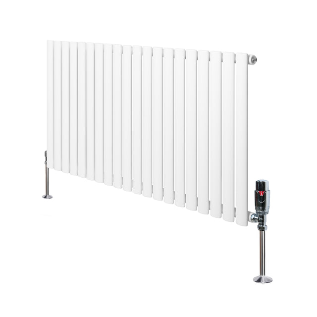 Sleek white oval single column radiator with vertical fins, featuring polished chrome valves and sturdy floor supports, ideal for modern interiors