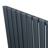 Anthracite grey oval single column radiator featuring sleek, rounded tubes and a modern design, measuring 1600mm x 240mm