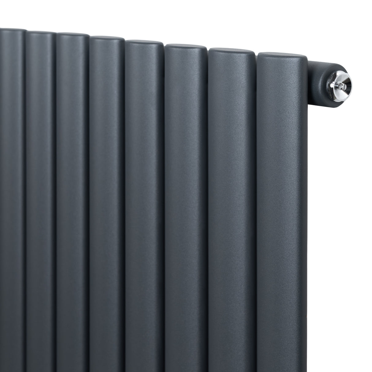 Anthracite grey oval single column radiator with sleek, rounded edges and a polished valve, ideal for modern interiors
