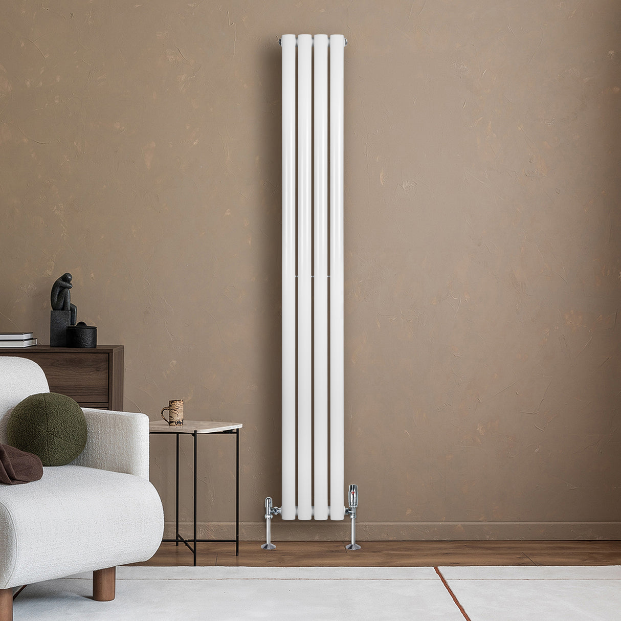 Sleek white oval single column radiator with polished valves, standing tall against a warm, textured wall in a modern living space