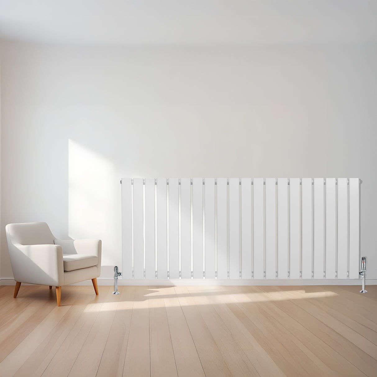 Sleek white flat single column radiator with vertical slats, positioned beside a modern armchair on light wooden flooring