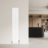 Sleek white flat single column radiator with chrome valves, positioned against a modern interior wall, enhancing contemporary decor