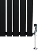 Sleek black flat single column radiator with polished chrome valves, featuring smooth, rectangular panels and a modern design