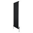 Sleek black flat single column radiator with vertical fins and chrome valves, measuring 1600mm x 560mm, ideal for modern interiors