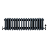 Traditional anthracite grey 4 column radiator with a sleek, modern design and polished valves, ideal for stylish heating solutions
