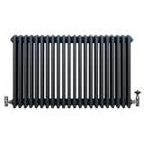 Traditional anthracite grey 4 column radiator with smooth, rounded edges and polished valves, ideal for classic home decor