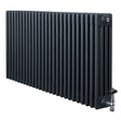 Traditional 4 column radiator in anthracite grey, featuring a sleek design with vertical lines and chrome valves for modern decor