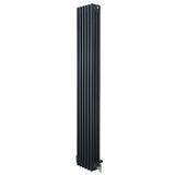 Tall anthracite grey traditional 4 column radiator with a sleek vertical design and polished valves, ideal for modern interiors