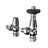 Polished chrome radiator valves with a sleek design, featuring a rounded top and angular body for efficient heating control