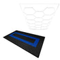 Hexagon LED light design above black and blue vented garage floor tiles, showcasing a textured surface and modern geometric pattern