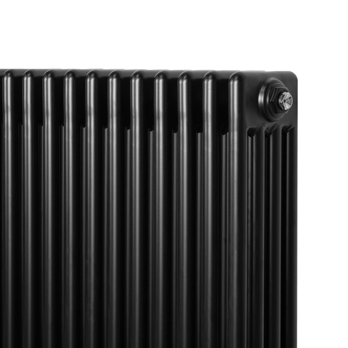 Traditional black 4 column radiator with a sleek, smooth finish, featuring vertical grooves and a compact design, measuring 600 x 605mm