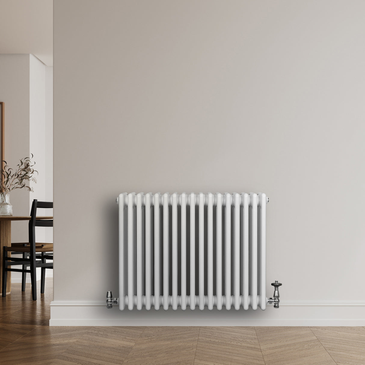 Traditional white 4 column radiator, 600 x 785mm, featuring smooth, glossy finish and sleek design, mounted on a light wall