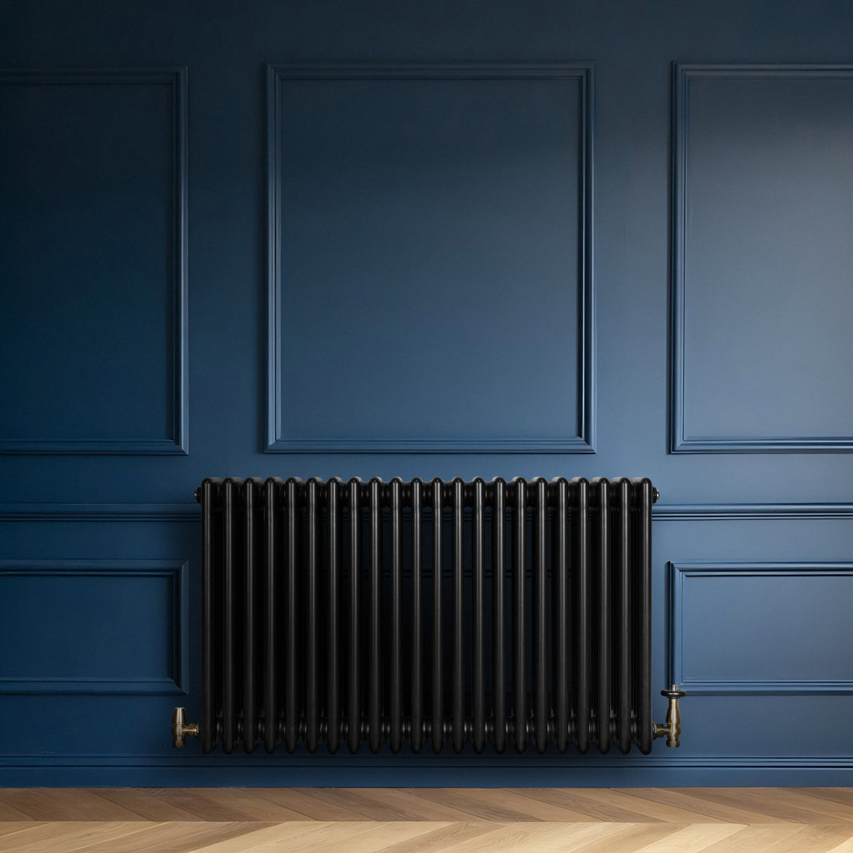 Traditional black 4 column radiator against a deep blue wall, featuring sleek lines and a glossy finish, ideal for vintage decor