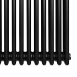 Traditional black 4 column radiator with a sleek, smooth finish, measuring 600 x 1190mm, ideal for classic home decor