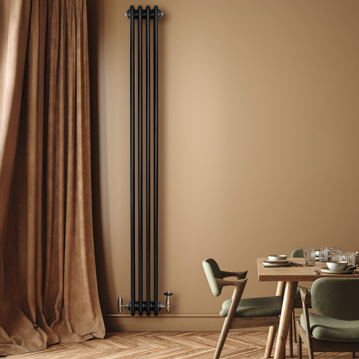 Sleek black traditional 4 column radiator mounted on a warm beige wall, complementing a stylish dining area with green chairs