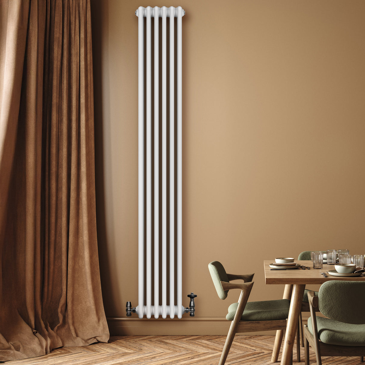 Vertical white traditional 4 column radiator mounted on a warm beige wall, complementing a cozy dining area with green chairs