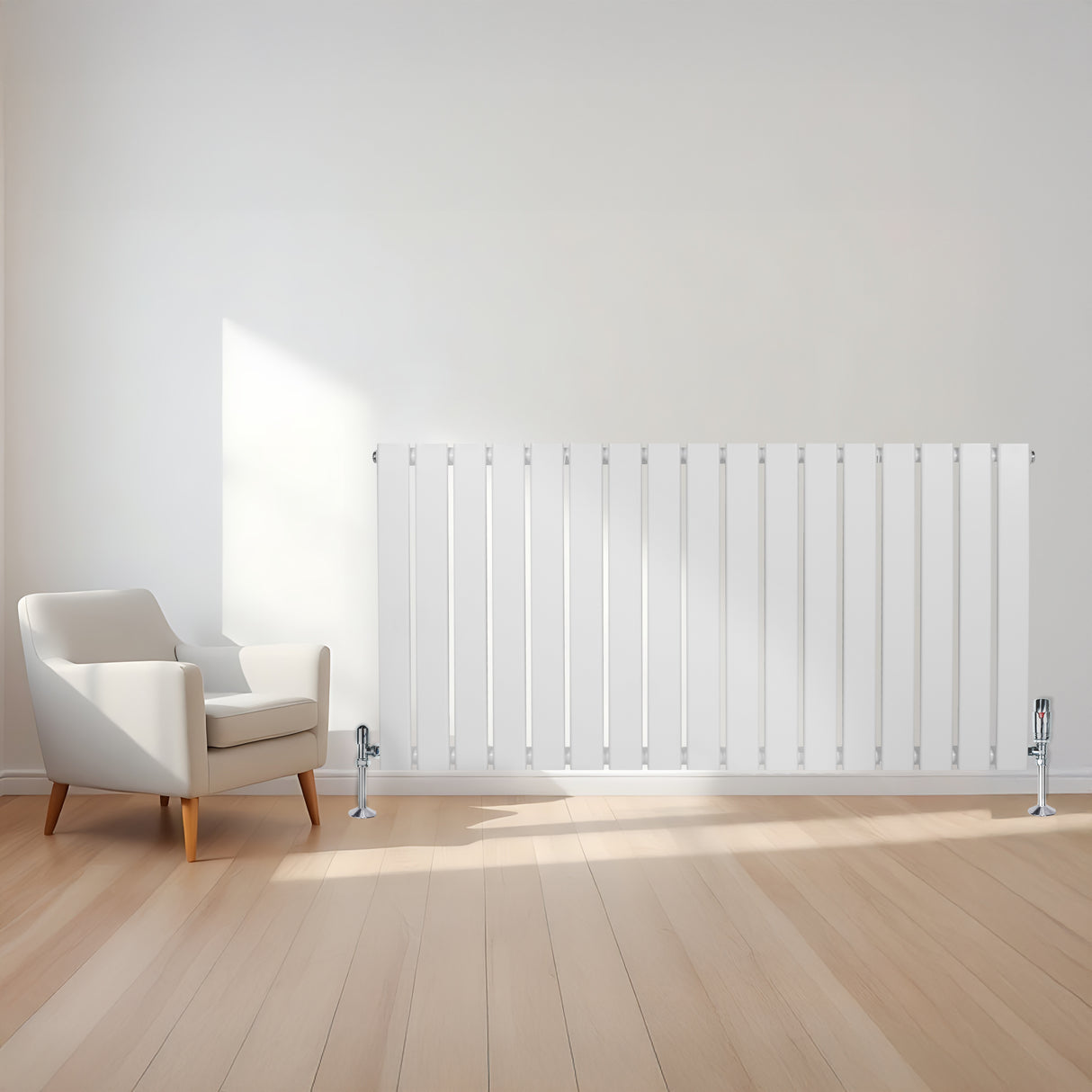 Sleek white flat single column radiator, 600 x 1190mm, mounted on a light wooden floor, beside a modern armchair in a bright room