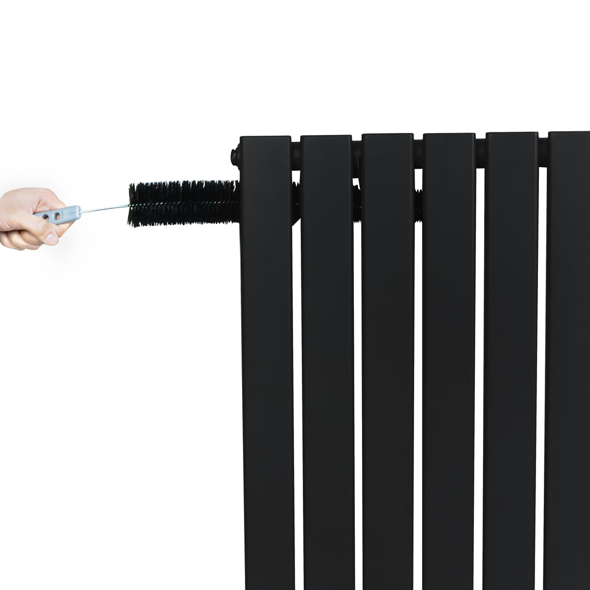 Sleek black flat single column radiator with a hand adjusting the valve, showcasing its modern design and sturdy construction