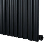 Sleek black oval single column radiator, 600 x 1020mm, featuring smooth, matte finish and modern design for efficient heating