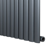Anthracite grey oval single column radiator, 600 x 1200mm, featuring sleek vertical lines and a matte finish for modern interiors