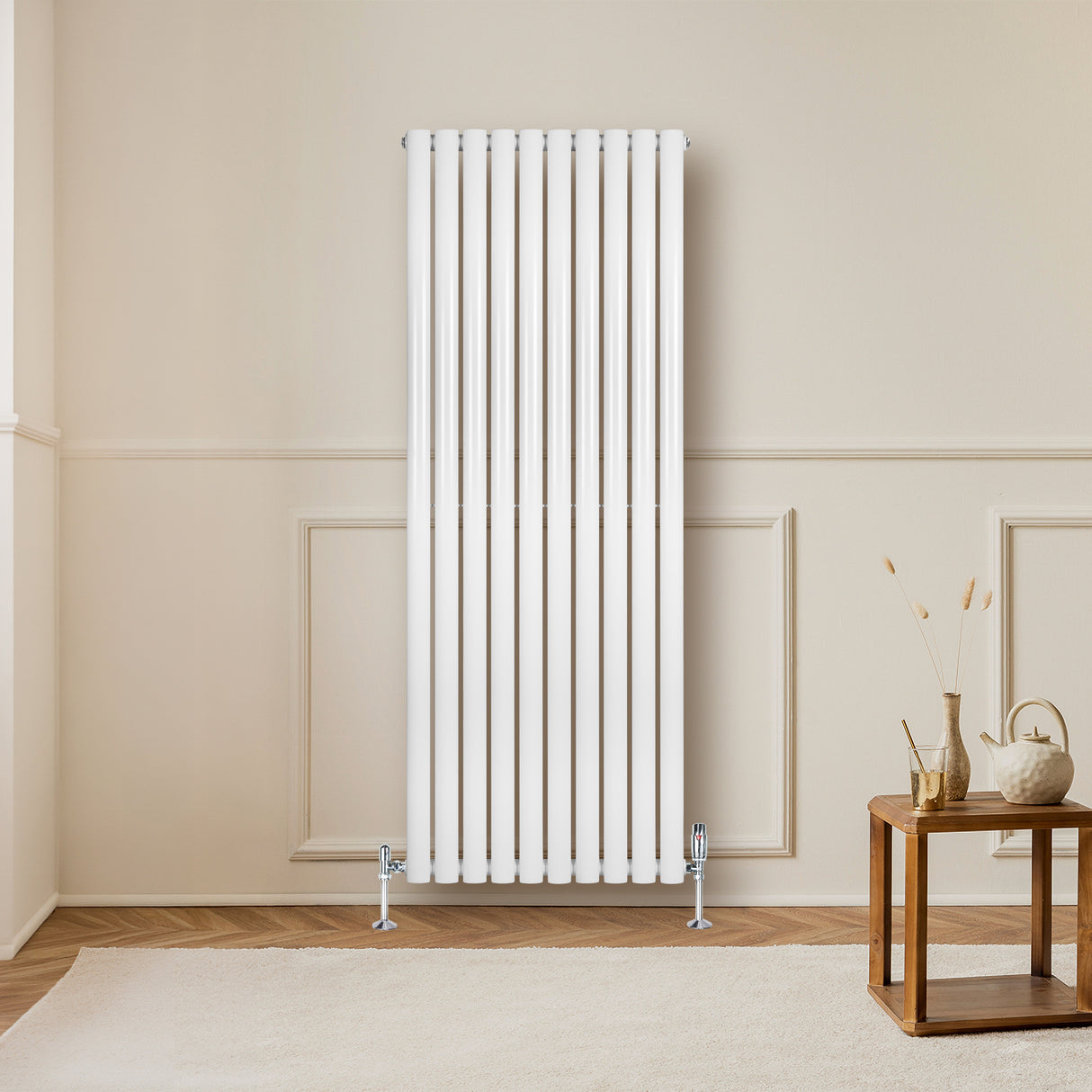 Sleek white oval single column radiator, 1600 x 600mm, featuring vertical bars and a modern design, mounted on a light wall